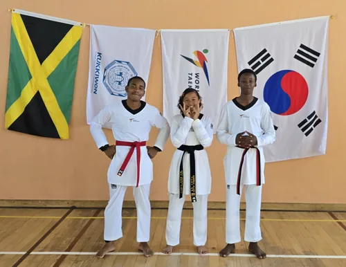 Team Jamaica squad for the US Open — Kukkiwon, World Taekwondo and Korean flags